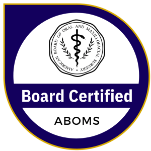 Board Certified badge from the American Board of Oral and Maxillofacial Surgery (ABOMS) with caduceus symbol